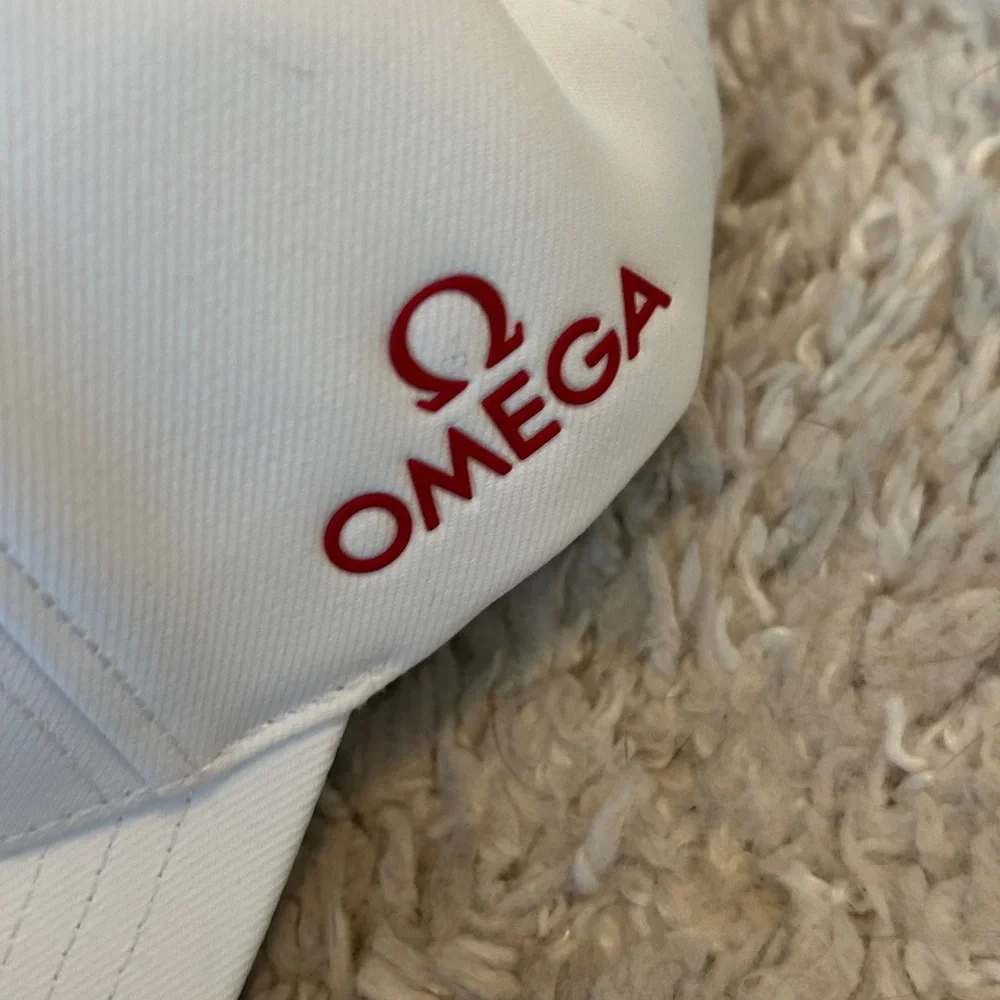 Omega White Hat with Red Emblem